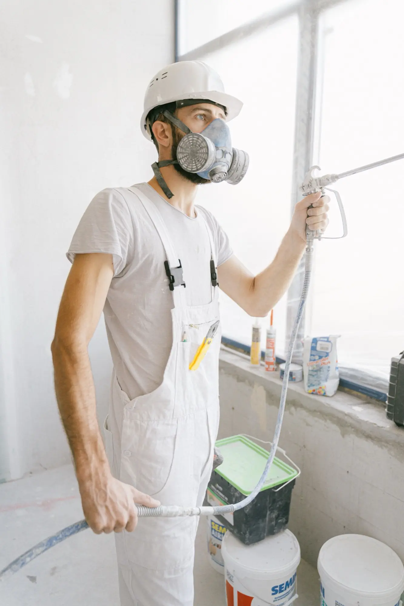 All Star painter cutting in a wall edge with precision