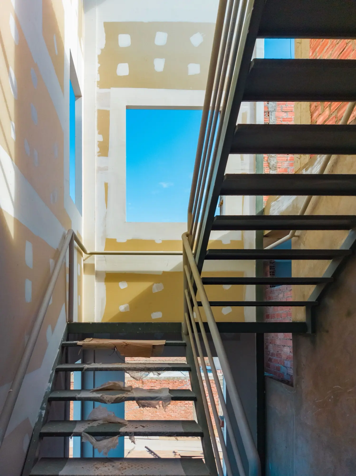 Commercial stairwell, void and decorative painting in a Liverpool apartment building